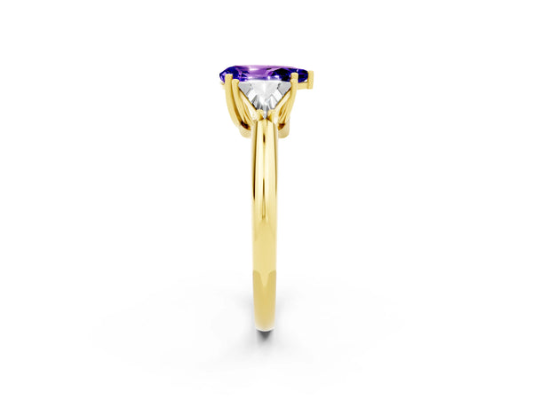 Yellow gold Three-Stone Pear Cut Tanzanite Engagement Ring with Trillion Side Stones and Prong Setting