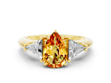 Yellow gold Three-Stone Pear Cut Cut Diamond Ring with Trillion Side Stones and Four-Prong Setting