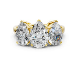 Yellow gold Three-Stone Pear Cut Diamond Ring with Channel Set Band and Four-Prong Setting_26