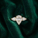 Yellow gold Three-Stone Pear Cut Diamond Ring with Channel Set Band and Four-Prong Setting_9