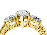 Yellow gold Three-Stone Pear Cut Diamond Ring with Channel-Set Band and Prong Setting_10