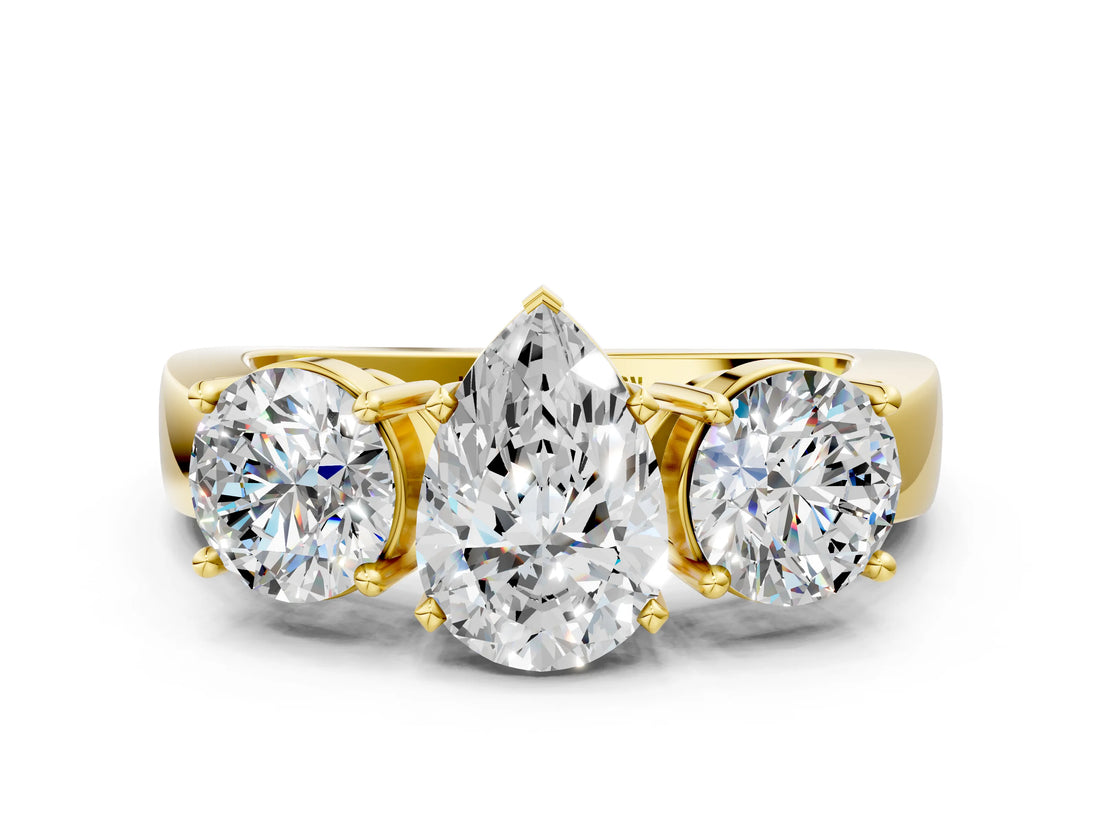 Yellow gold Three-Stone Pear Cut Diamond Ring with Round Side Stones, Classic Band, and Four-Prong Setting_7