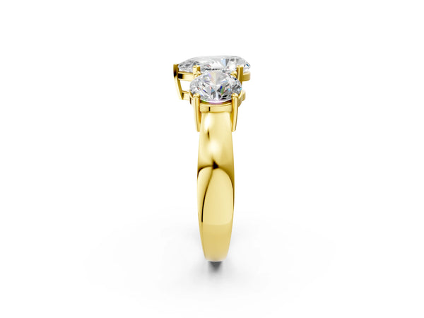 Yellow gold Three-Stone Pear Cut Diamond Ring with Round Side Stones, Classic Band, and Four-Prong Setting