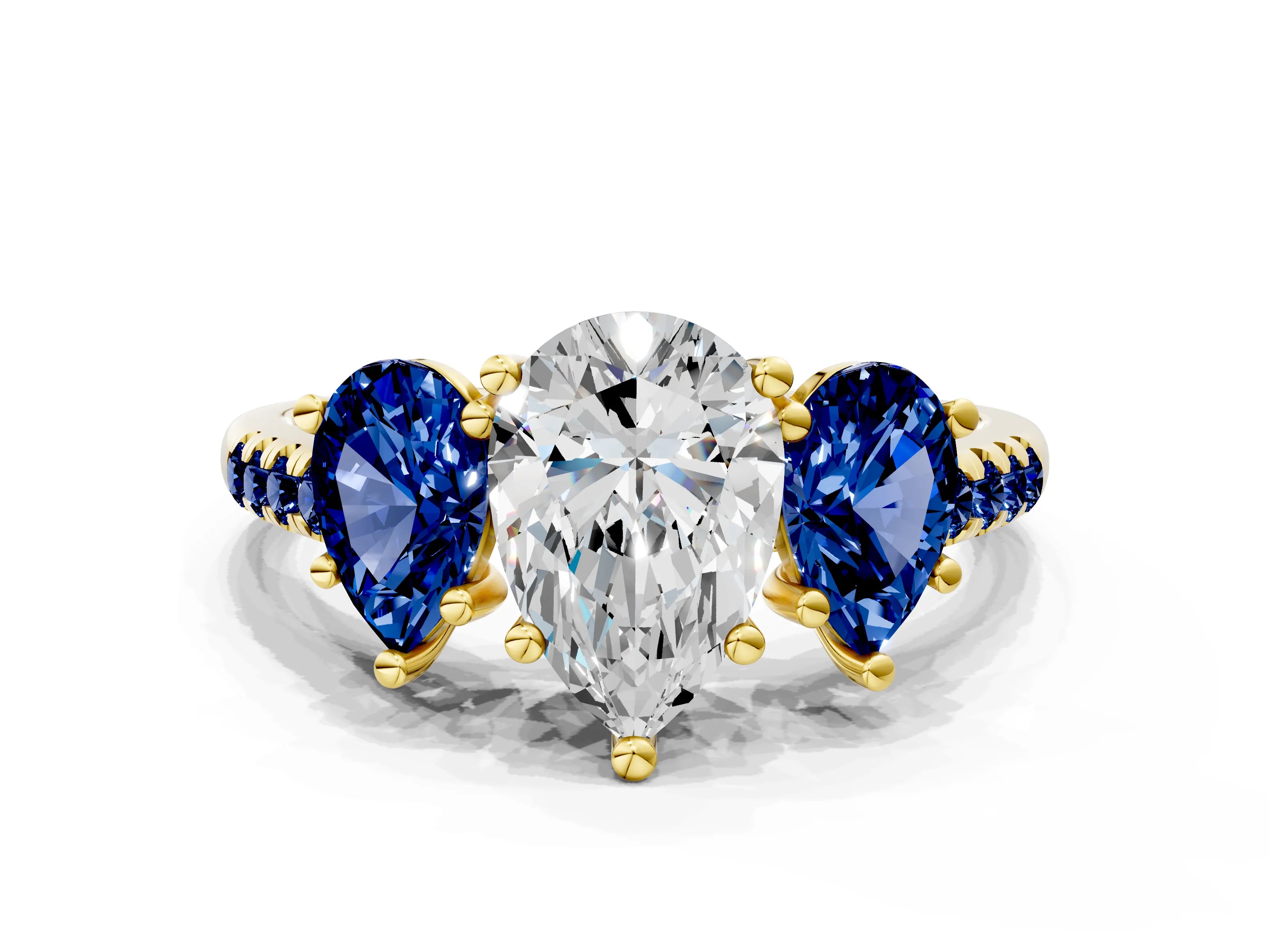Yellow gold Three-Stone Pear Cut Diamond Ring with Round with Blue Sapphire side stone Pavé Band and Prong Setting