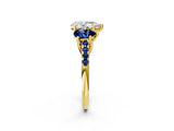 Yellow gold Three-Stone Pear Cut Diamond Ring with Round with Blue Sapphire side stone Pavé Band and Prong Setting_2