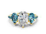 Yellow gold Three-Stone Pear Cut Diamond Ring with Round with Blue Topaz side stone Pavé Band and Prong Setting