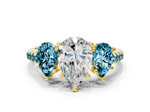 Yellow gold Three-Stone Pear Cut Diamond Ring with Round with Blue Topaz side stone Pavé Band and Prong Setting