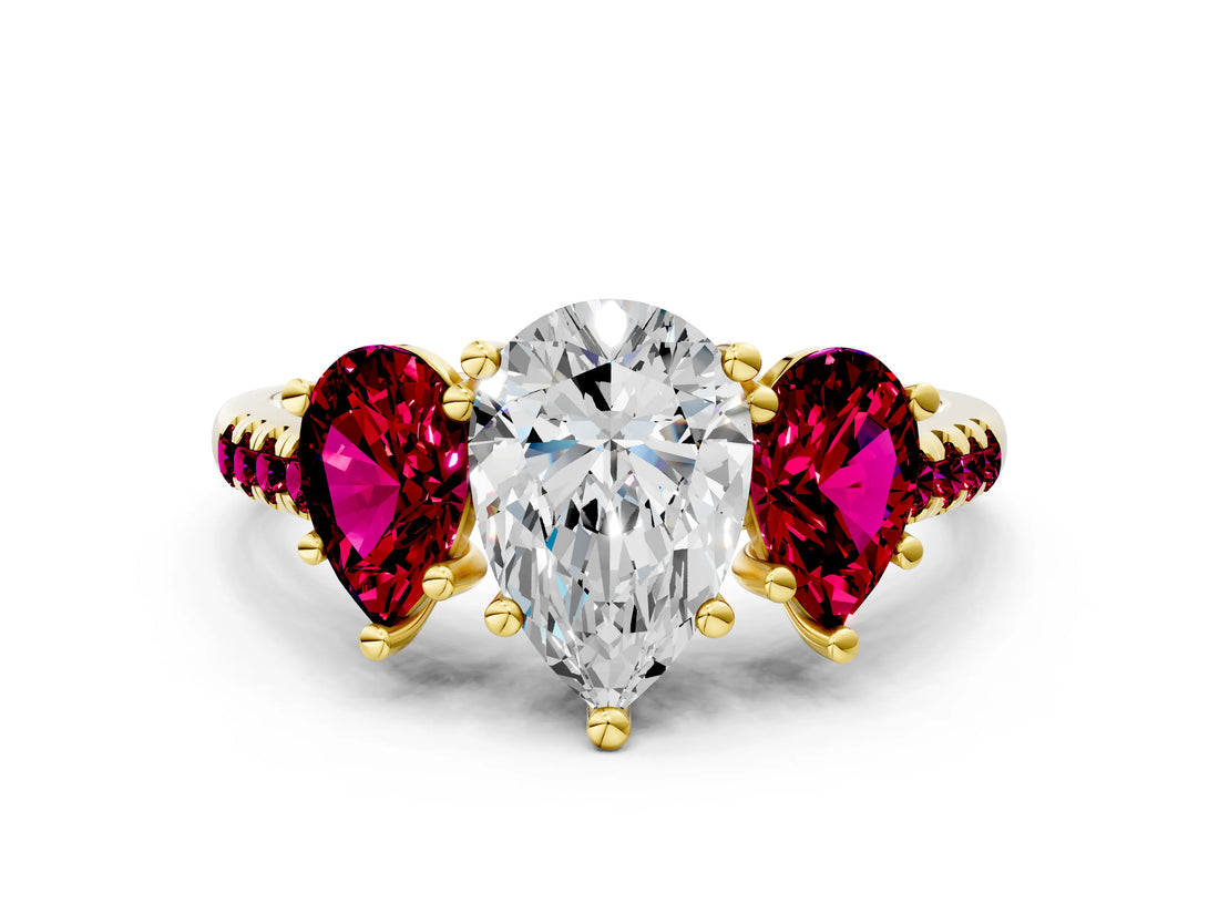 Yellow gold Three-Stone Pear Cut Diamond Ring with Round with Garnet side stone Pavé Band and Prong Setting