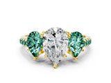 Yellow gold Three-Stone Pear Cut Diamond Ring with Round with Green Sapphire side stone Pavé Band and Prong Setting