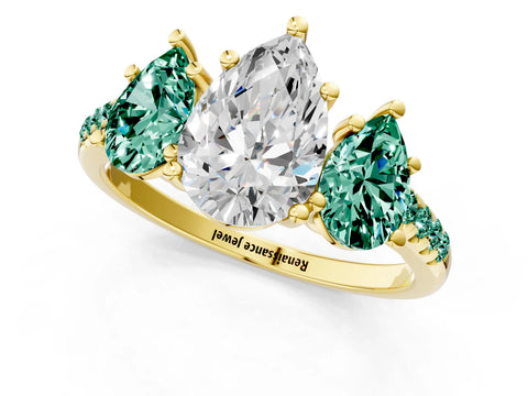 Yellow gold Three-Stone Pear Cut Diamond Ring with Round with Green Sapphire side stone Pavé Band and Prong Setting_1