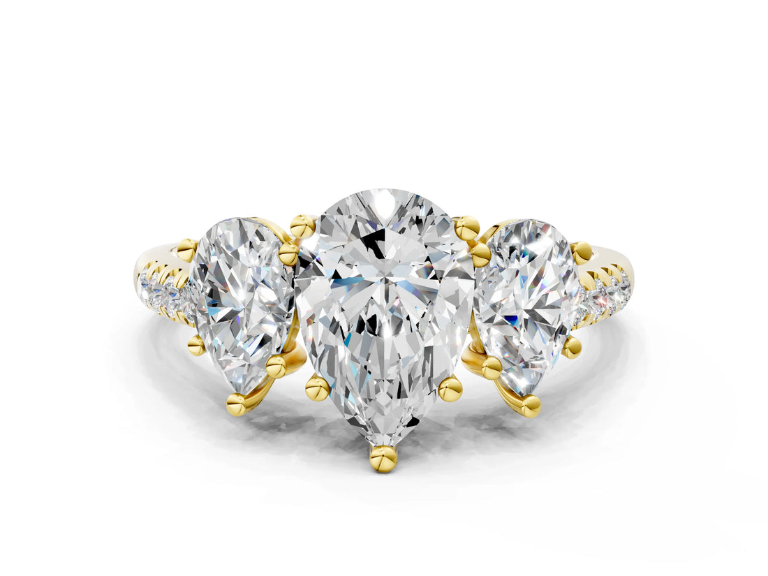 Yellow gold Three-Stone Pear Cut Diamond Ring with Round with Moissanite side stone Pavé Band and Prong Setting