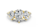 Yellow gold Three-Stone Pear Cut Diamond Ring with Round with Moissanite side stone Pavé Band and Prong Setting
