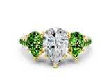 Yellow gold Three-Stone Pear Cut Diamond Ring with Round with Peridot side stone Pavé Band and Prong Setting