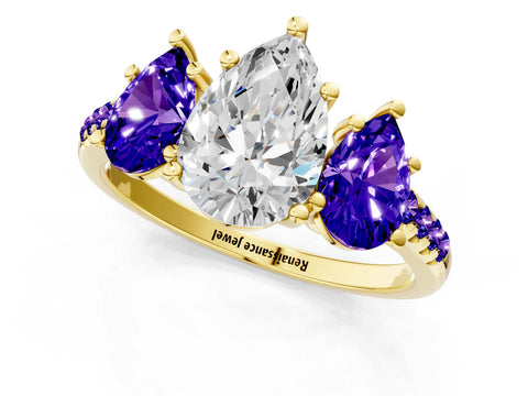 Yellow gold Three-Stone Pear Cut Diamond Ring with Round with Tanzanite side stone Pavé Band and Prong Setting_1