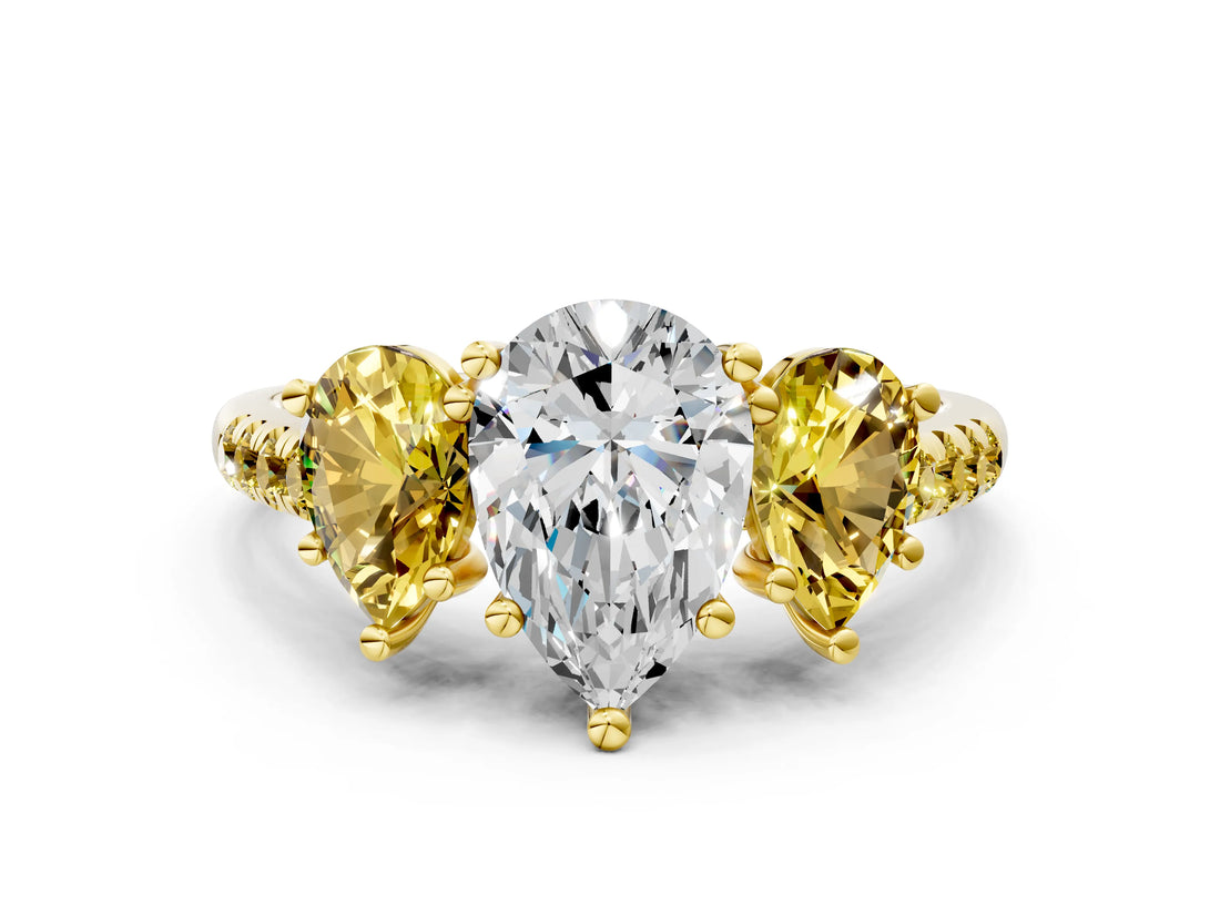 Yellow gold Three-Stone Pear Cut Diamond Ring with Round with Yellow Sapphire side stone Pavé Band and Prong Setting