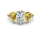 Yellow gold Three-Stone Pear Cut Diamond Ring with Round with Yellow Sapphire side stone Pavé Band and Prong Setting