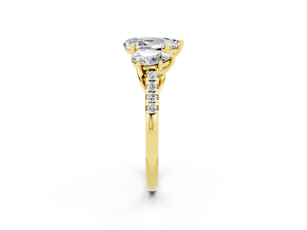 Yellow gold Three-Stone Pear Cut Moissanite Ring with Round  Pavé Band and Prong Setting