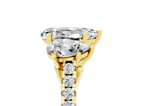 Yellow gold Three-Stone Pear Cut Moissanite Ring with Pavé Band and Prong Setting_17