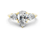 Yellow gold Three-Stone Pear Cut Moissanite Ring with Pear Side Stones and Four-Prong Setting