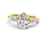 Yellow gold Three-Stone Pear Cut Moissanite Ring with Pear  Side Stones in Four-Prong Setting_12