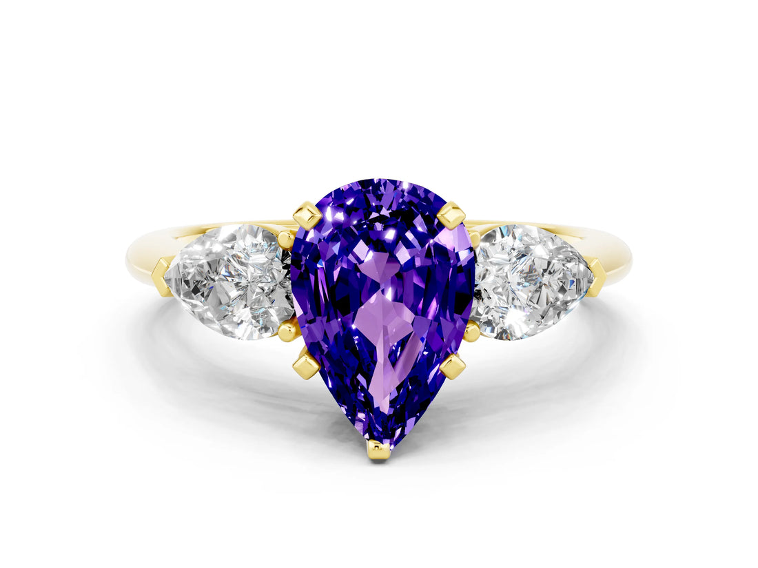 Yellow gold Three-Stone Pear Cut Tanzanite Ring with Pear Side Stones and Four-Prong Setting