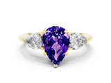 Yellow gold Three-Stone Pear Cut Tanzanite Ring with Pear Side Stones and Four-Prong Setting