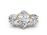 Yellow gold Three-Stone Pear Diamond Engagement Ring with Prong Setting on a Classic Band_11