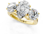 Yellow gold Three-Stone Pear Diamond Engagement Ring with Prong Setting on a Classic Band_12