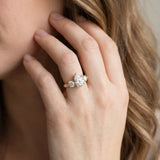 Yellow gold Three-Stone Pear Diamond Engagement Ring with Prong Setting on a Classic Band_5