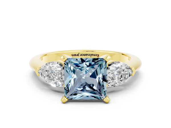 Yellow gold Three-Stone Princess Cut Aquamarine Ring with Pear Side Stones and Four-Prong Setting