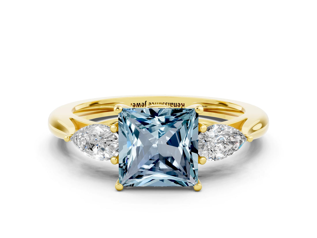 Yellow gold Three-Stone Princess Cut Aquamarine Ring with Pear  Side Stones in Four-Prong Setting_36