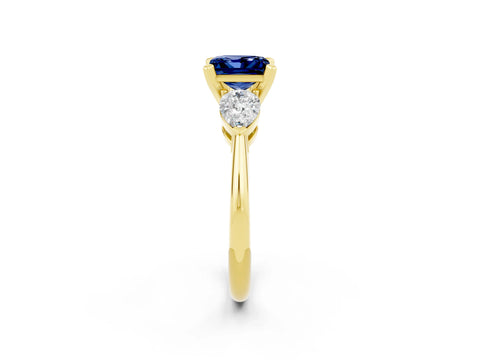 Yellow gold Three-Stone Princess Cut Blue Sapphire Ring with Pear Side Stones and Four-Prong Setting_2