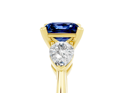 Yellow gold Three-Stone Princess Cut Blue Sapphire Ring with Pear Side Stones and Four-Prong Setting_5