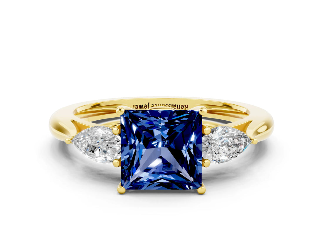 Yellow gold Three-Stone Princess Cut Blue Sapphire Ring with Pear  Side Stones in Four-Prong Setting_12