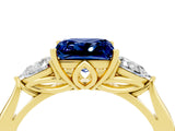 Yellow gold Three-Stone Princess Cut Blue Sapphire Ring with Pear  Side Stones in Four-Prong Setting_16