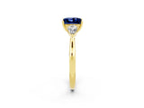 Yellow gold Three-Stone Princess Cut Blue Sapphire Ring with Pear  Side Stones in Four-Prong Setting_38