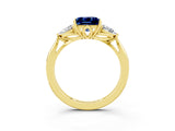 Yellow gold Three-Stone Princess Cut Blue Sapphire Ring with Pear  Side Stones in Four-Prong Setting_39