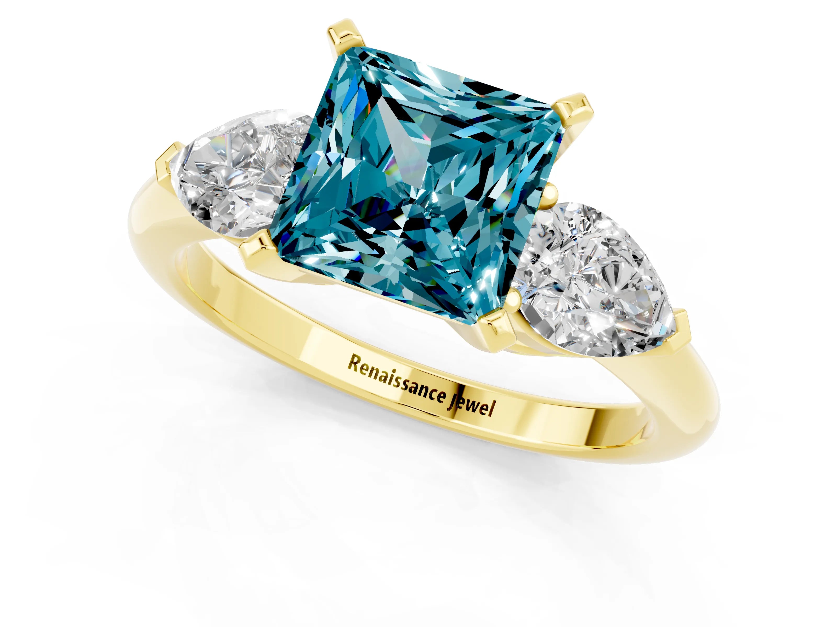 Yellow gold Three-Stone Princess Cut Blue Topaz Ring with Pear Side Stones and Four-Prong Setting_1