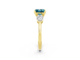 Yellow gold Three-Stone Princess Cut Blue Topaz Ring with Pear Side Stones and Four-Prong Setting_2