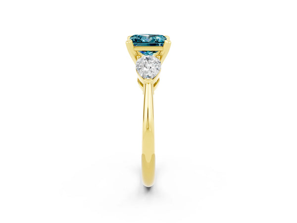 Yellow gold Three-Stone Princess Cut Blue Topaz Ring with Pear Side Stones and Four-Prong Setting