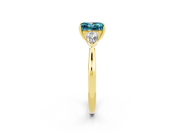 Yellow gold Three-Stone Princess Cut Blue Topaz Ring with Pear  Side Stones in Four-Prong Setting