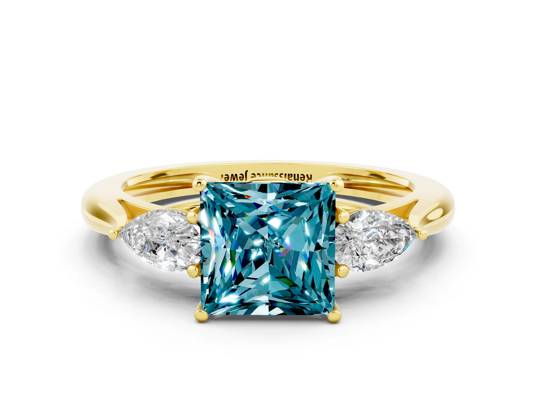 Yellow gold Three-Stone Princess Cut Blue Topaz Ring with Pear  Side Stones in Four-Prong Setting_36