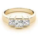 Yellow gold Three Stone Princess Cut Channel Set Diamond Ring 1