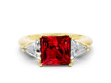 Yellow gold Three-Stone Princess Cut Cut Diamond Ring with Trillion Side Stones and Four-Prong Setting