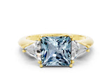 Yellow gold Three-Stone Princess Cut Cut Diamond Ring with Trillion Side Stones and Four-Prong Setting