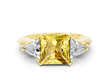 Yellow gold Three-Stone Princess Cut Cut Diamond Ring with Trillion Side Stones and Four-Prong Setting