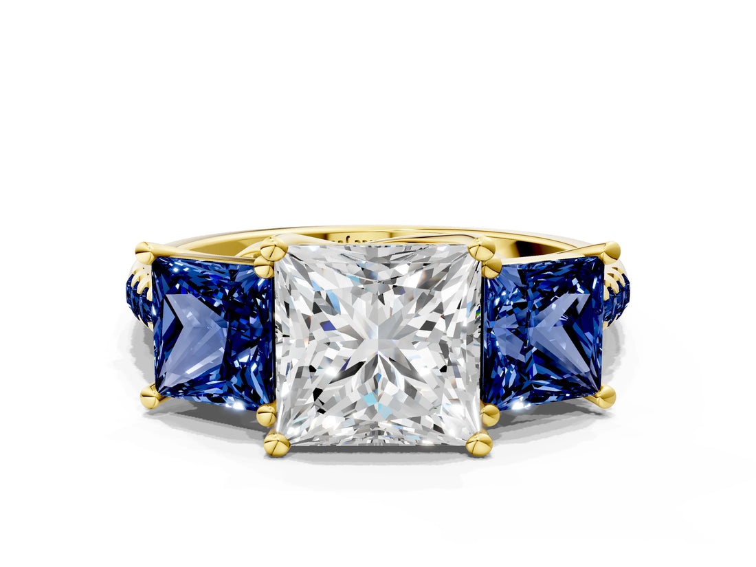 Yellow gold Three-Stone Princess Cut Diamond Ring with Round with Blue Sapphire side stone Pavé Band and Prong Setting