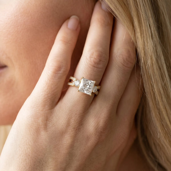 Yellow gold Three-Stone Princess Cut Diamond Twist Band with Prong Setting