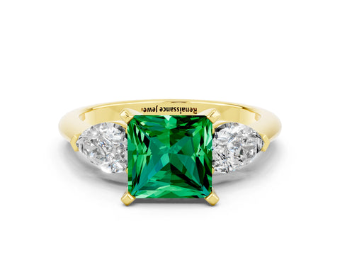 Yellow gold Three-Stone Princess Cut Emerald Ring with Pear Side Stones and Four-Prong Setting