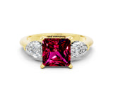 Yellow gold Three-Stone Princess Cut Garnet Ring with Pear Side Stones and Four-Prong Setting
